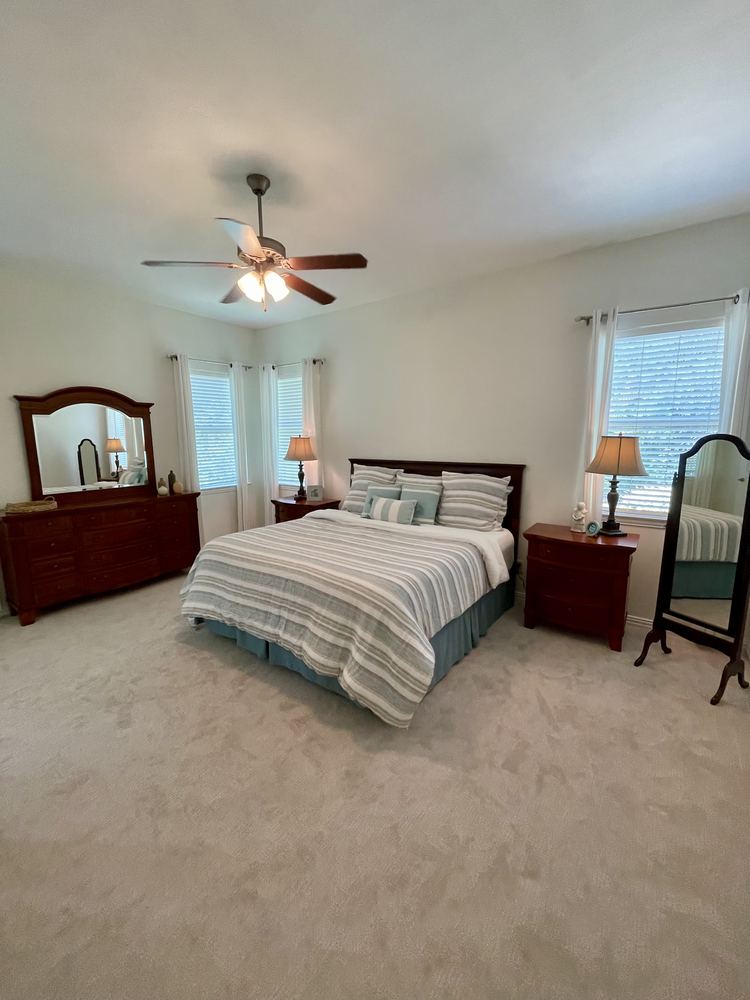 Primary bedroom after staging